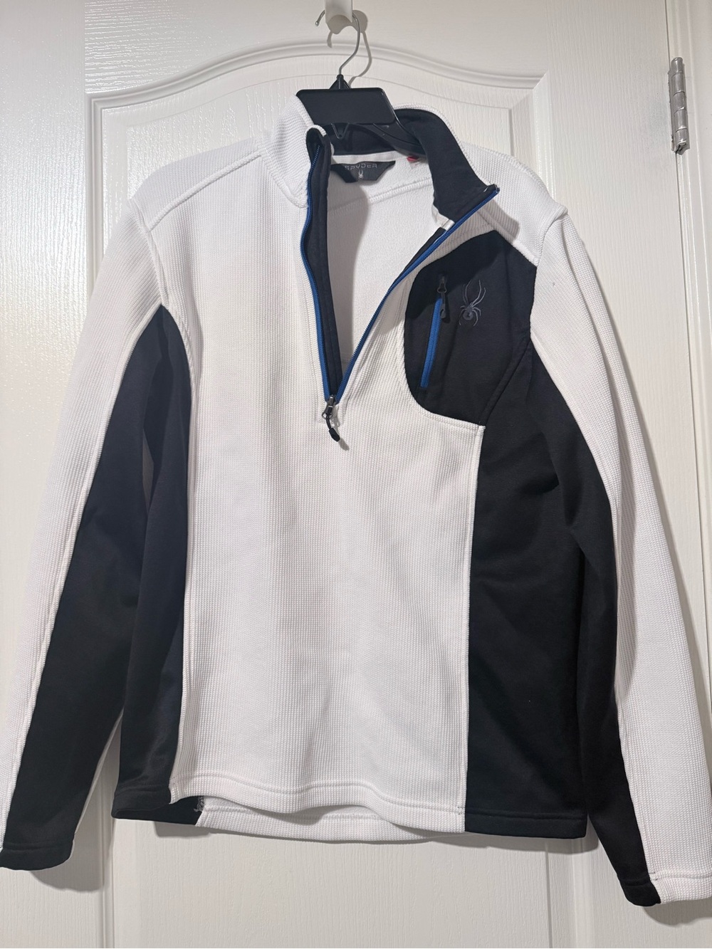 Spyder Men’s White and Black Half-Zip Performance Jacket with Blue Accents